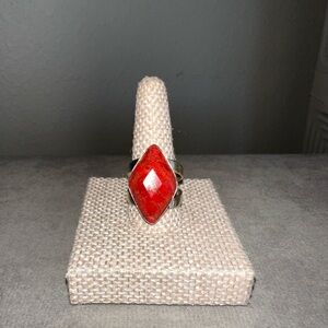 Red coral diamond shaped stone set in sterling silver by Jay King